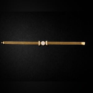 Pandora yellow Gold plated bracelet with rose gold plated charms